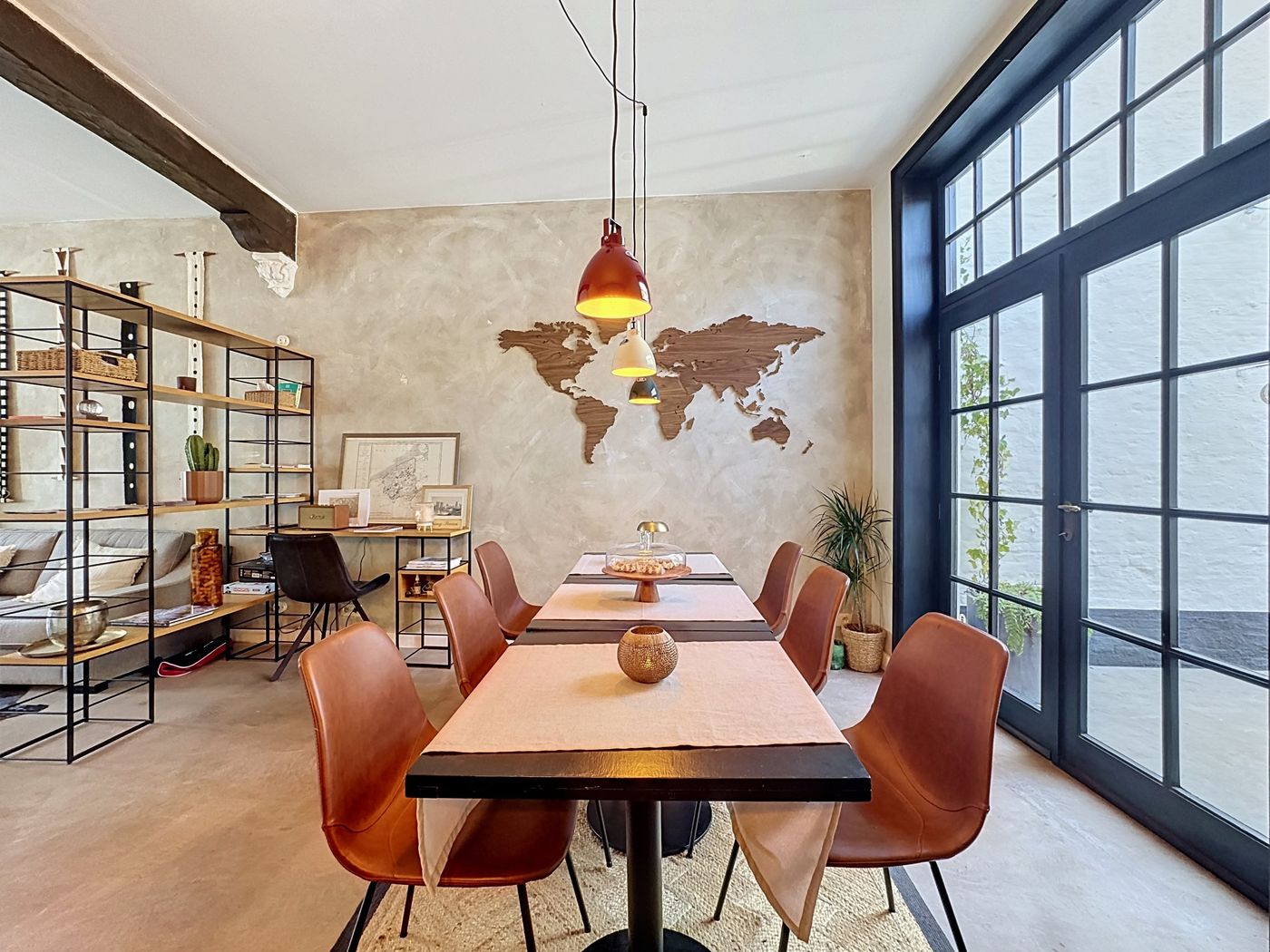 Breakfast table beside the courtyard doors