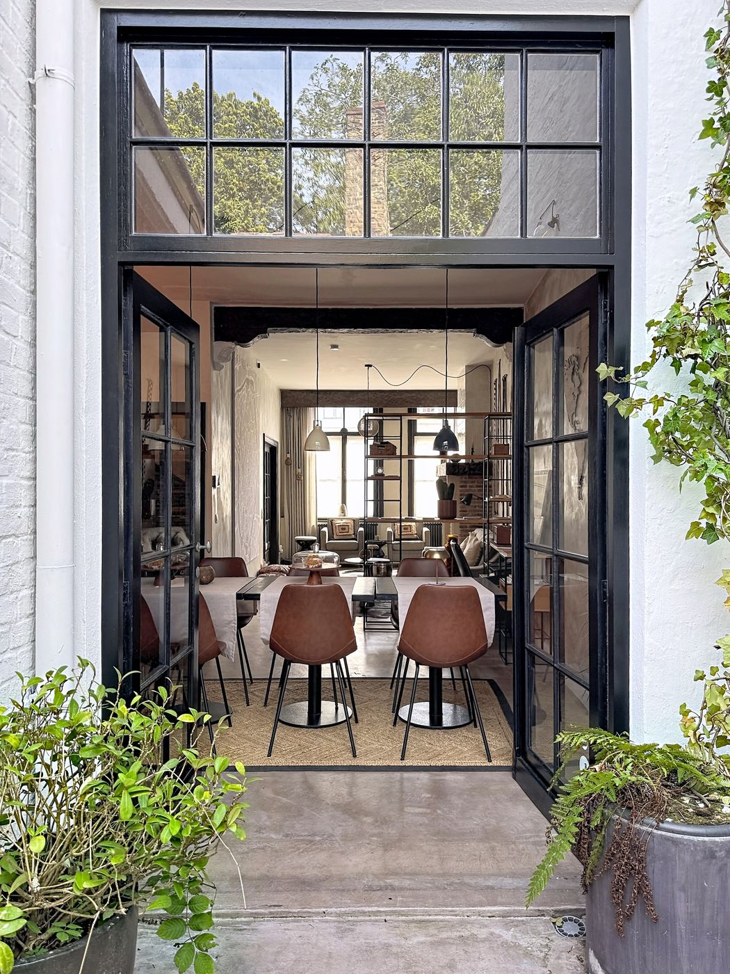 The tall courtyard doors into the breakfast room
