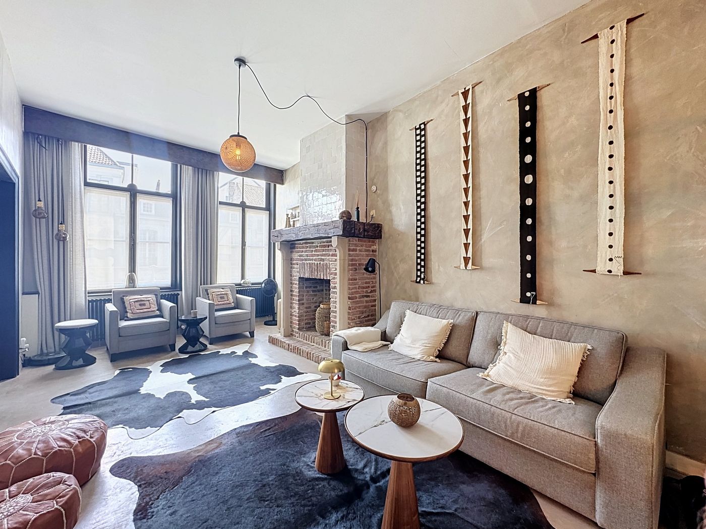 The lounge with its original brick fireplace