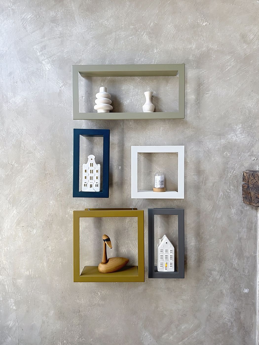 Bruges house miniatures on the lounge wall