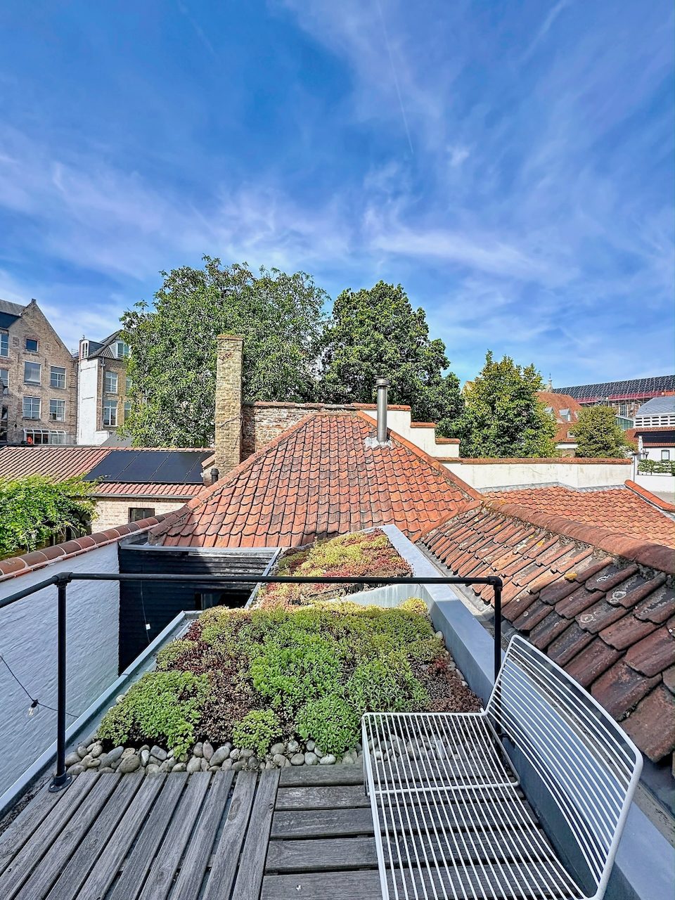 The private roof terrace, over the Bruges rooftops